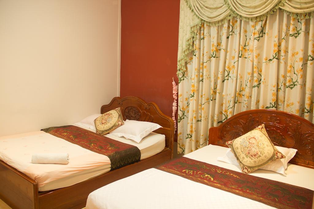 Royal Guest House Phnom Penh Zimmer foto